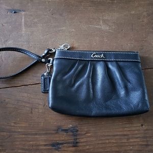 Black leather COACH wristlet